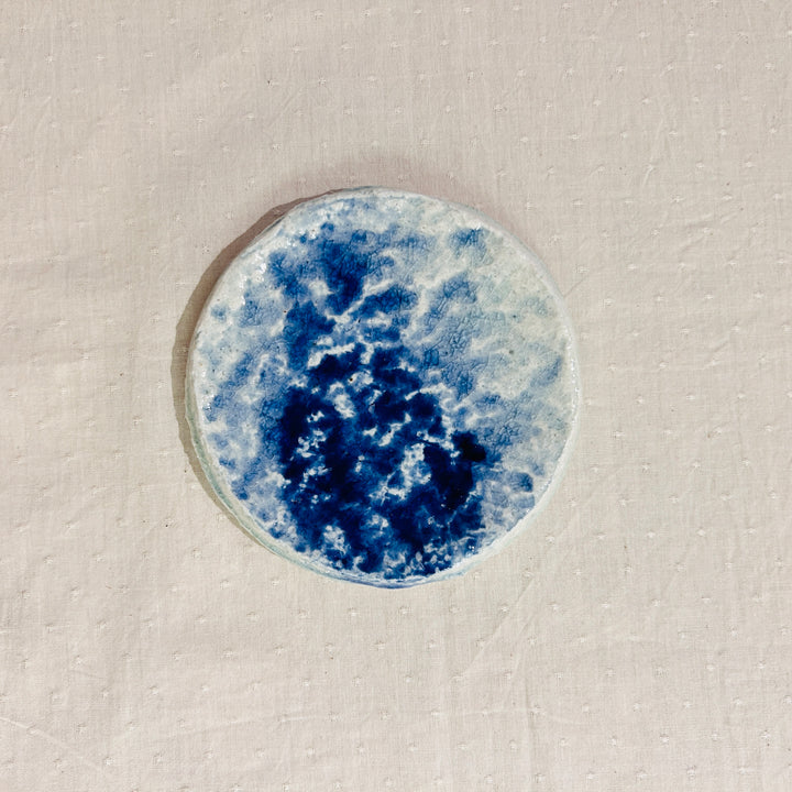 Flowing color hammered plate 