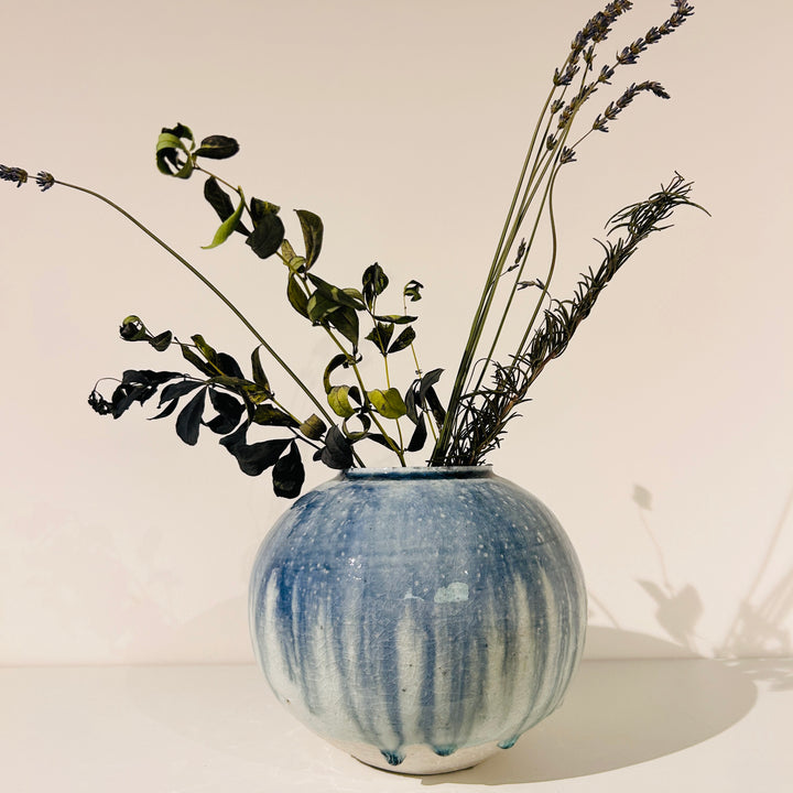 Flowing round vase