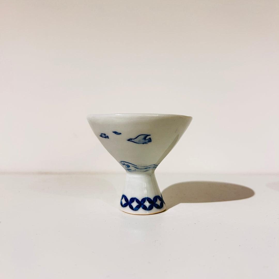 Sake cup backstroke