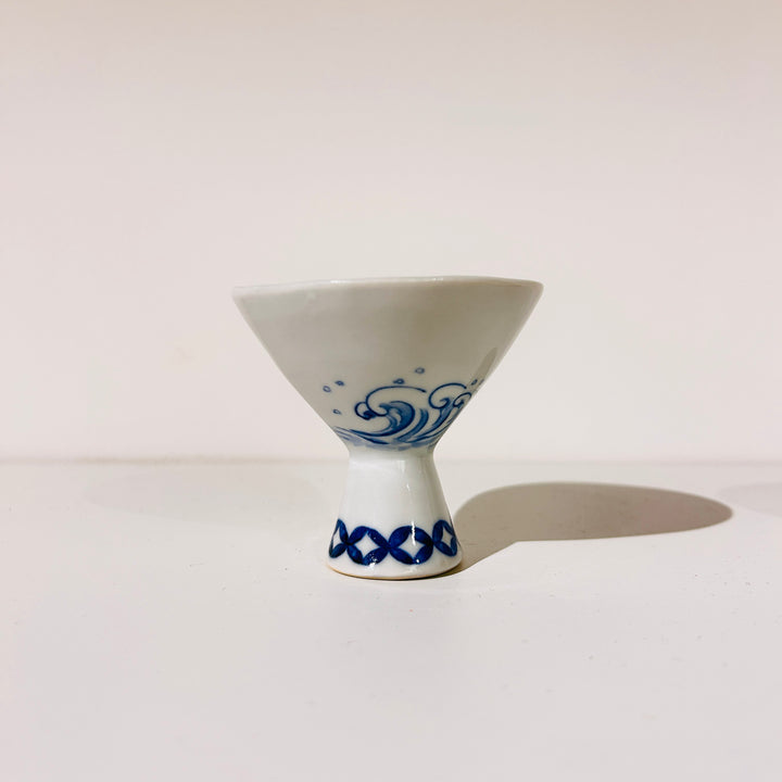 Sake cup backstroke