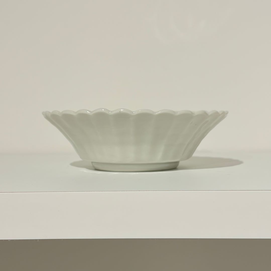 Small blue and white bowl with fruit and flower motif