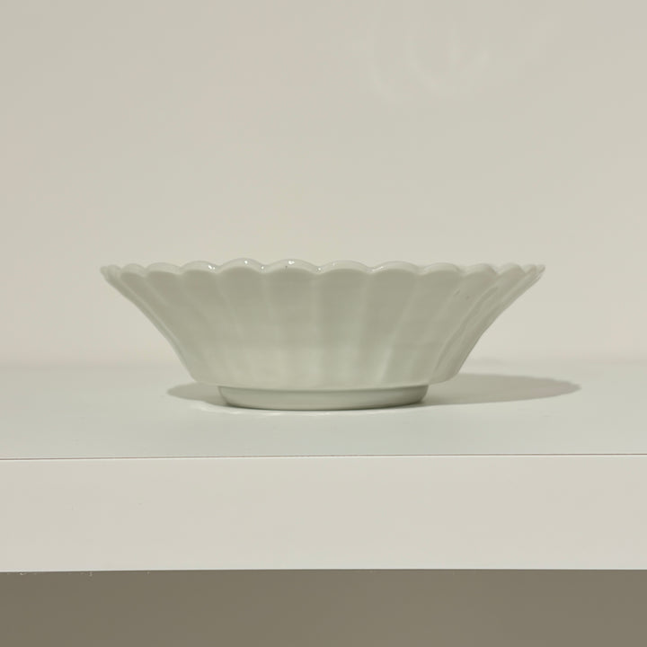 Small blue and white bowl with fruit and flower motif